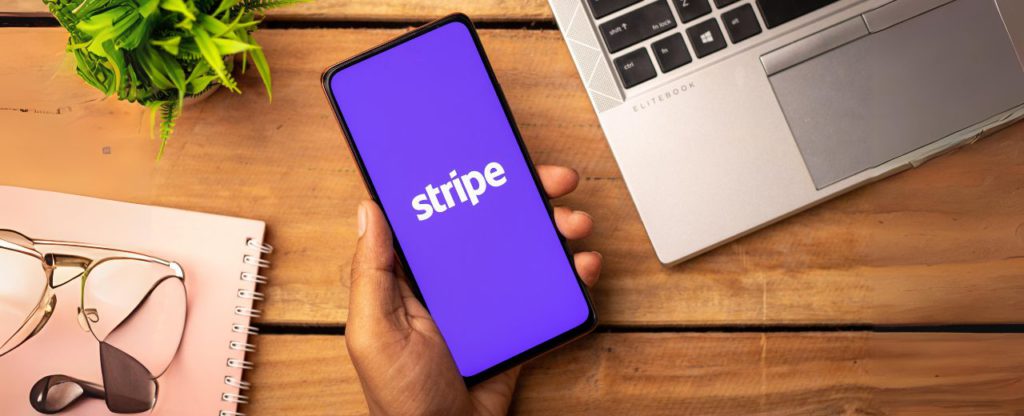 Stripe logo on phone screen stock image.